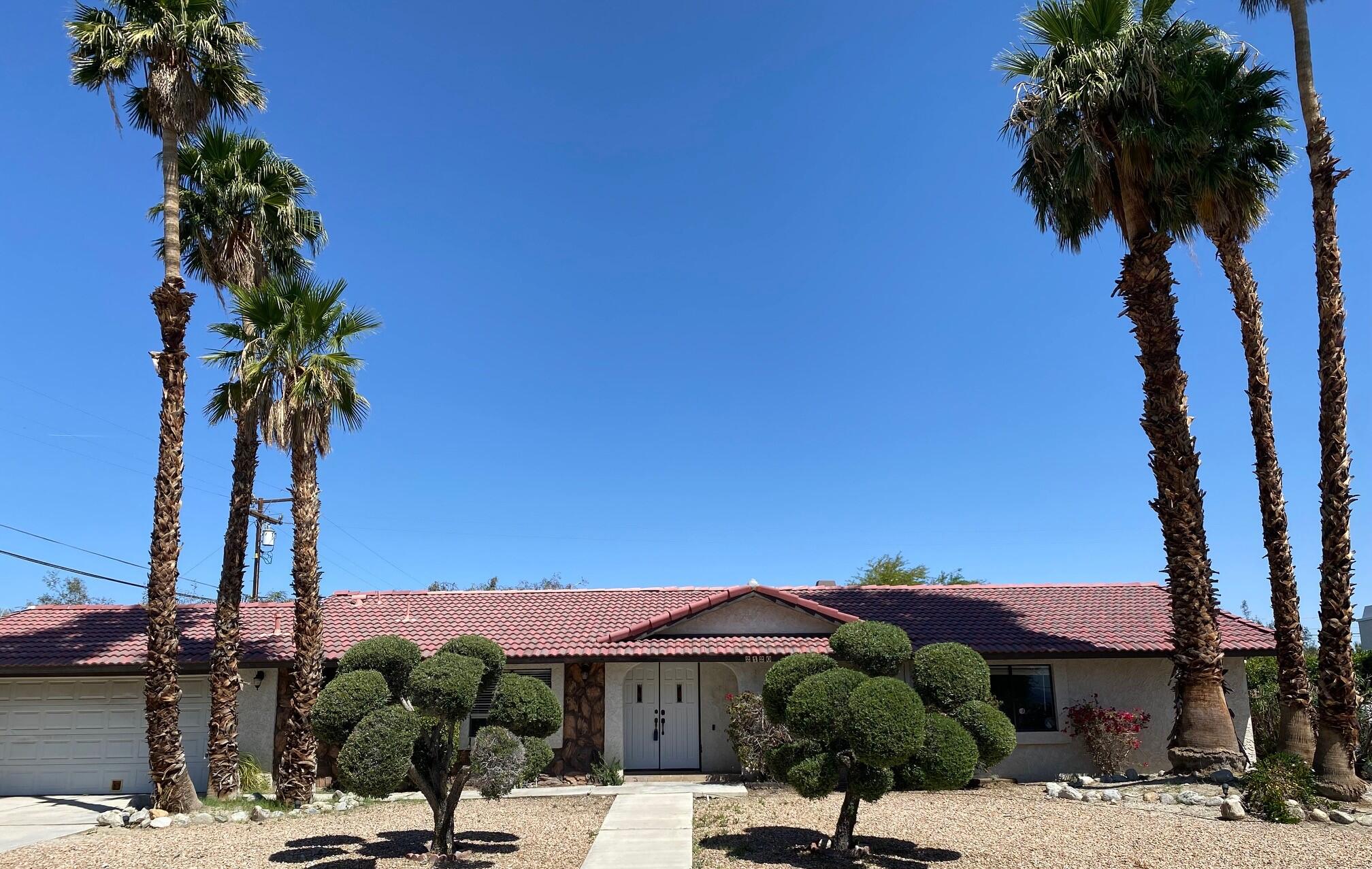 a view of a street with a building in front of it
