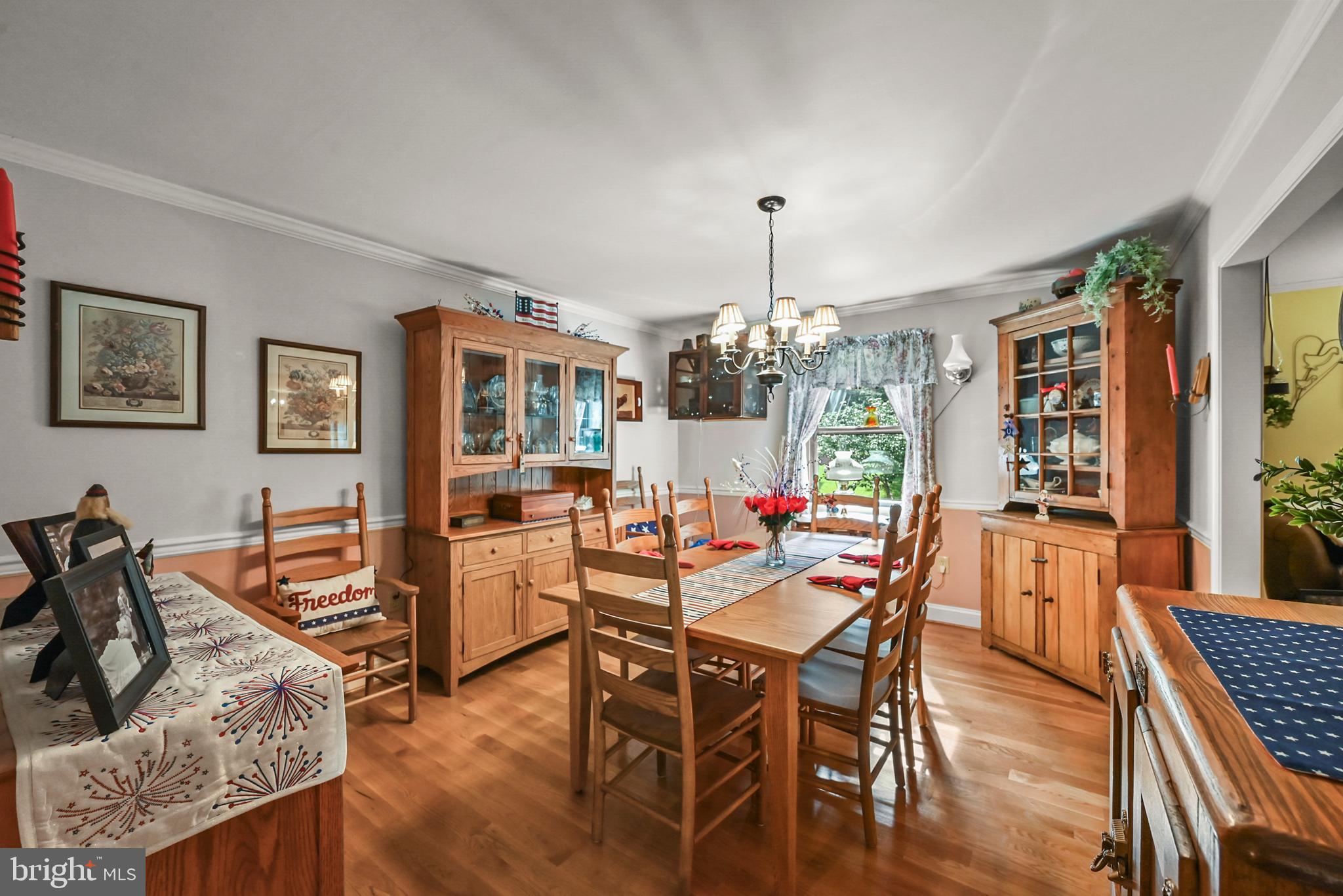 961 Beaver Creek Road Hanover, PA 17331 - Photo 24 of 52 a view of a dining room with furniture window and wooden floor
