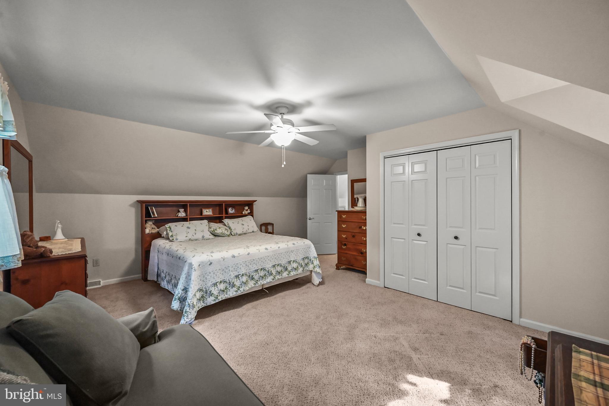 961 Beaver Creek Road Hanover, PA 17331 - Photo 36 of 52 a bedroom with a bed and a chandelier