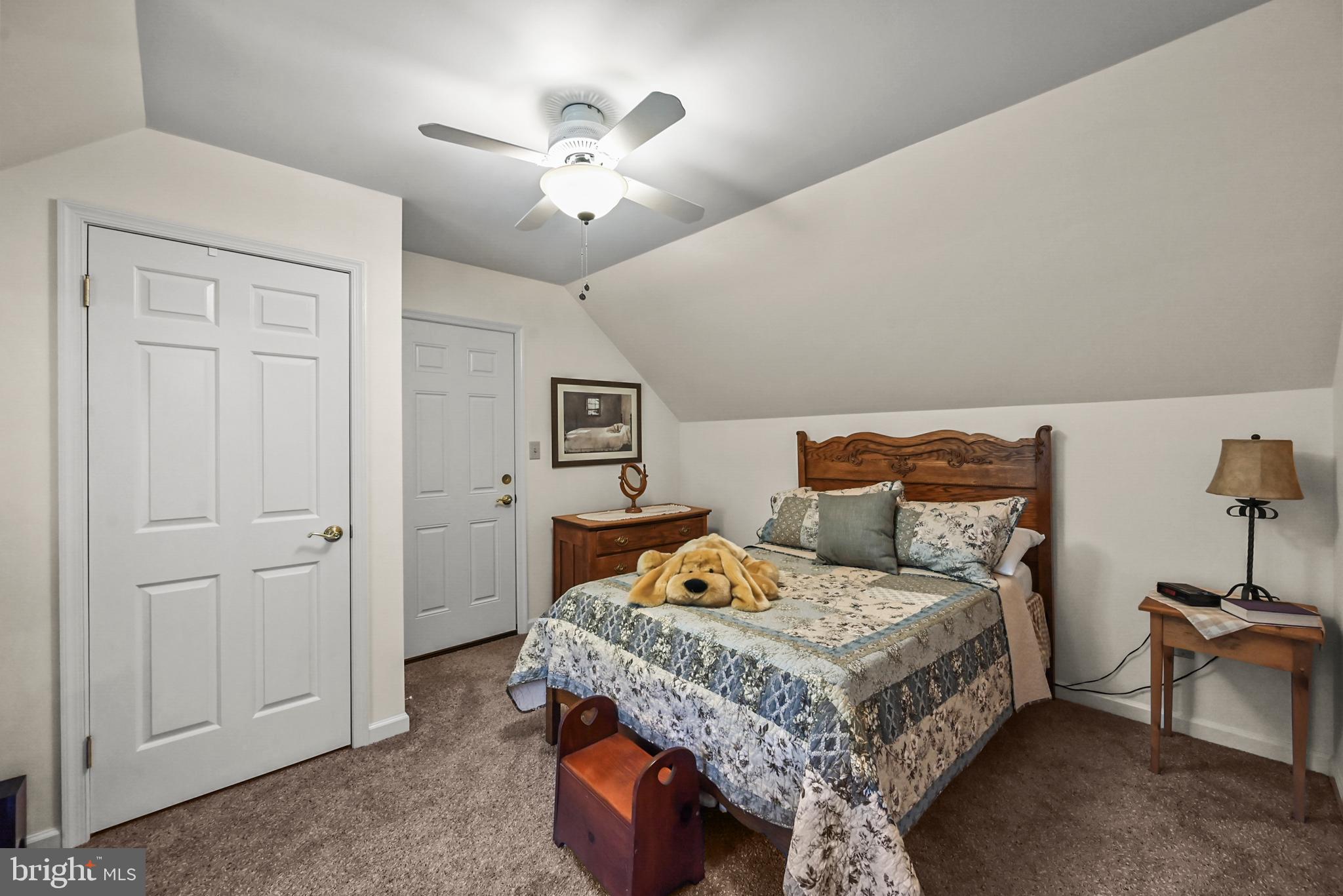 961 Beaver Creek Road Hanover, PA 17331 - Photo 39 of 52 a bedroom with a bed and a chandelier