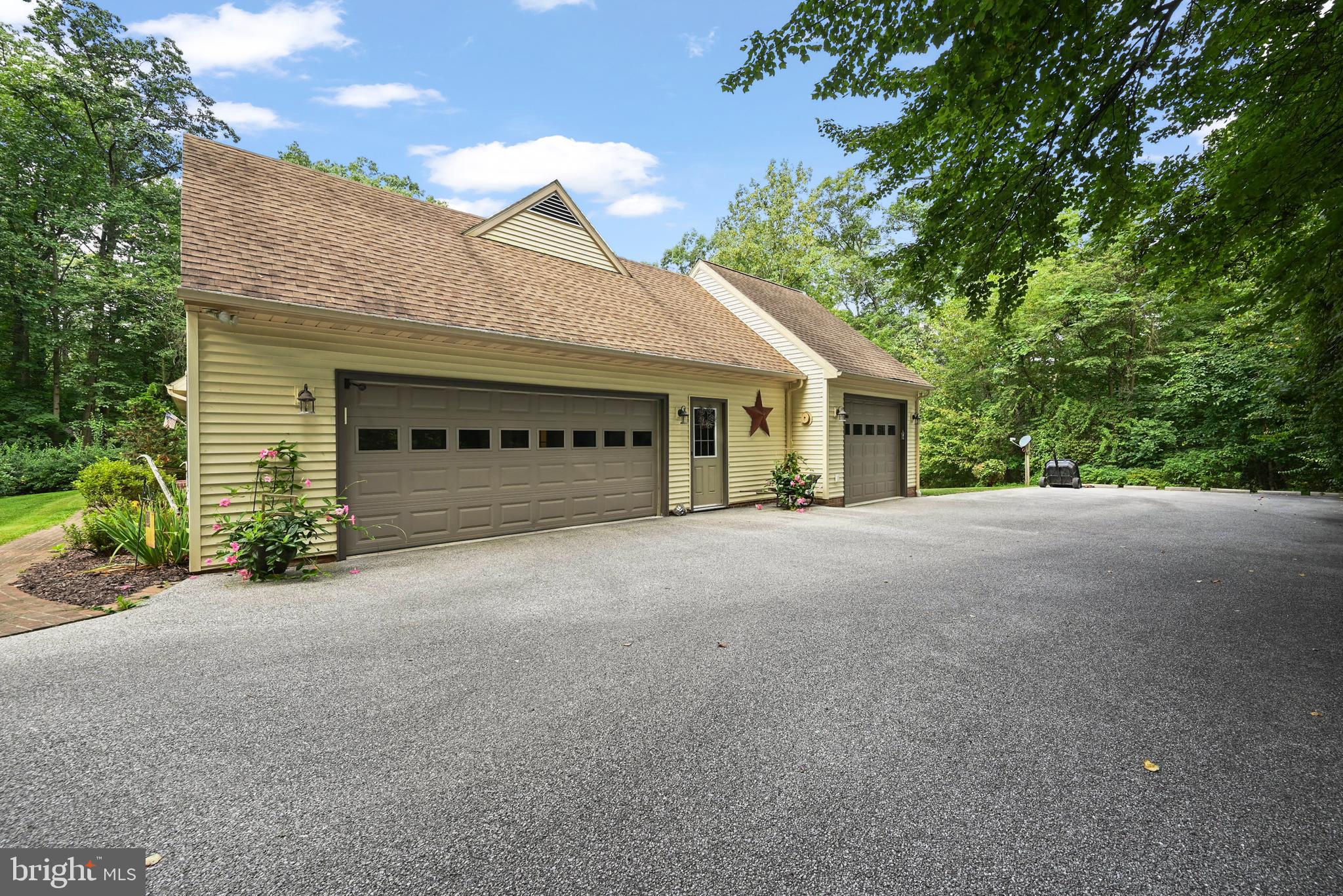 961 Beaver Creek Road Hanover, PA 17331 - Photo 43 of 52 a view of a house with a garage and yard