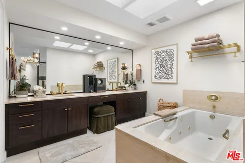 an aerial view of a house with yard swimming pool and outdoor seating