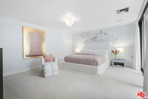 a view of a patio with table and chairs with wooden floor and a yard
