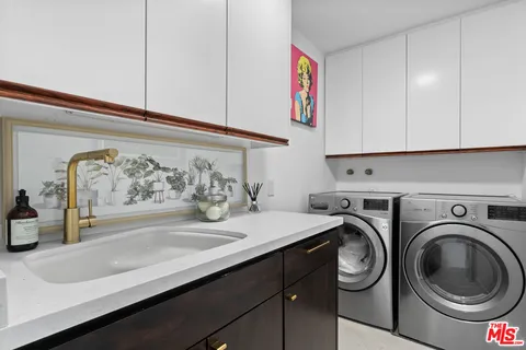 a view of swimming pool with a patio