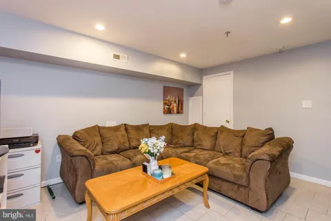 a living room with furniture and a couch