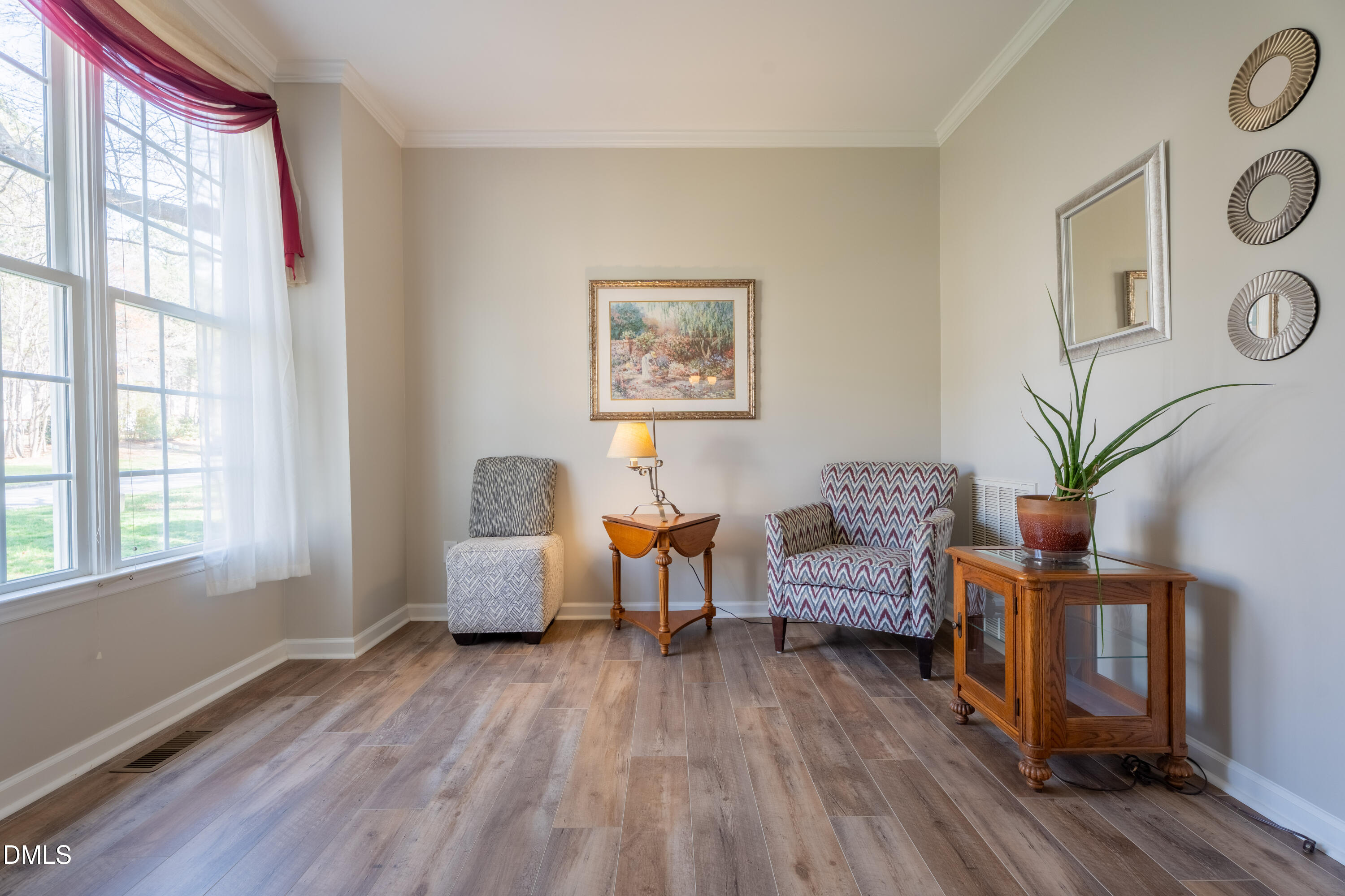 1305 Olde Walker Mill Road Apex, NC 27502 - Photo 11 of 41 a living room with furniture and wooden floor