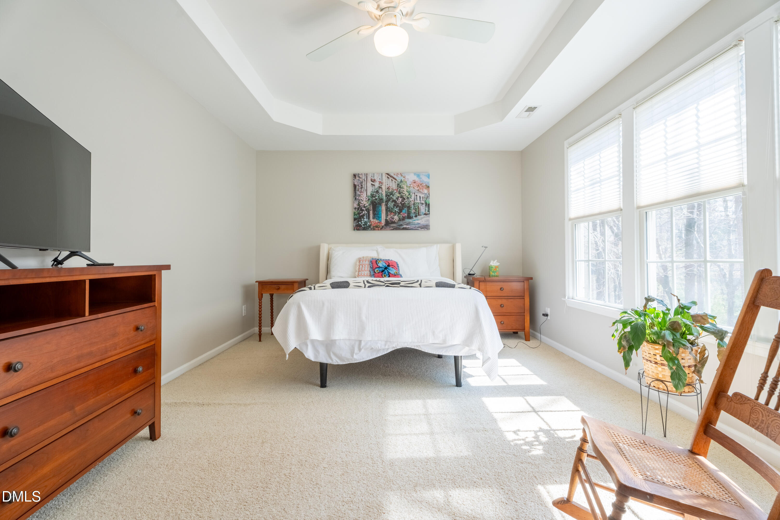 1305 Olde Walker Mill Road Apex, NC 27502 - Photo 17 of 41 a bedroom with a bed and a window
