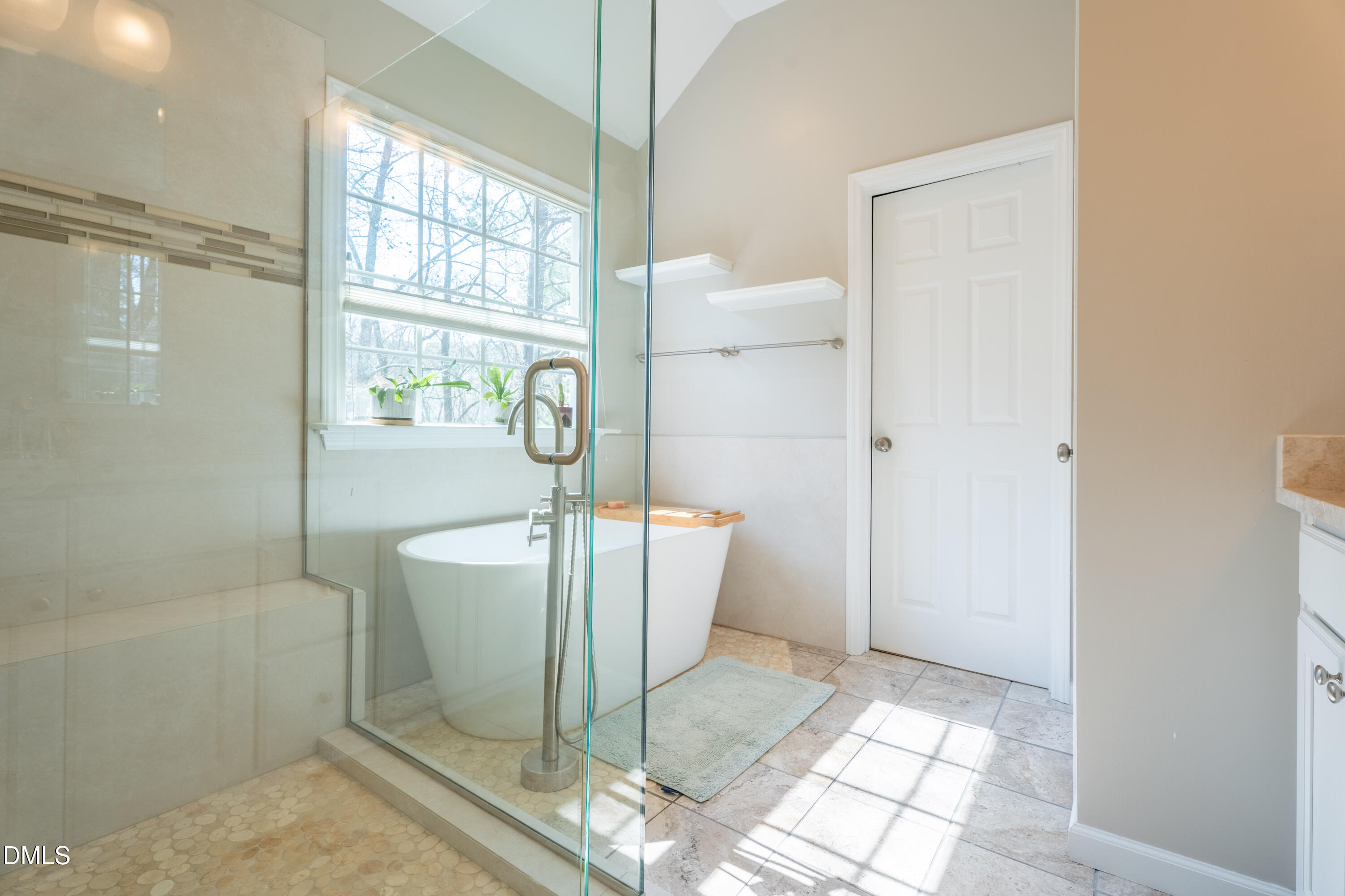 1305 Olde Walker Mill Road Apex, NC 27502 - Photo 20 of 41 a living room with a bath tub and shower