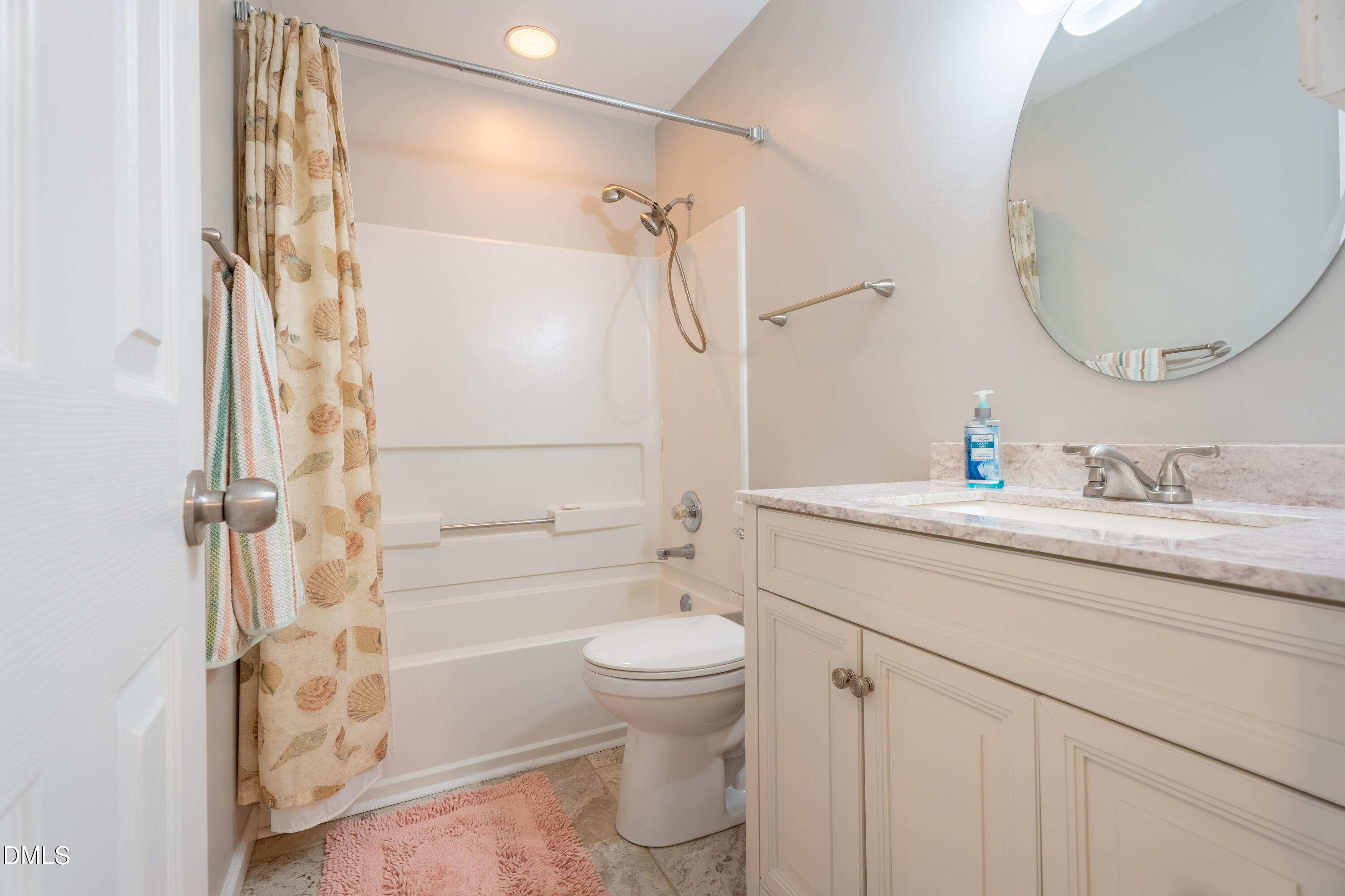 1305 Olde Walker Mill Road Apex, NC 27502 - Photo 25 of 41 a bathroom with a granite countertop sink toilet and shower