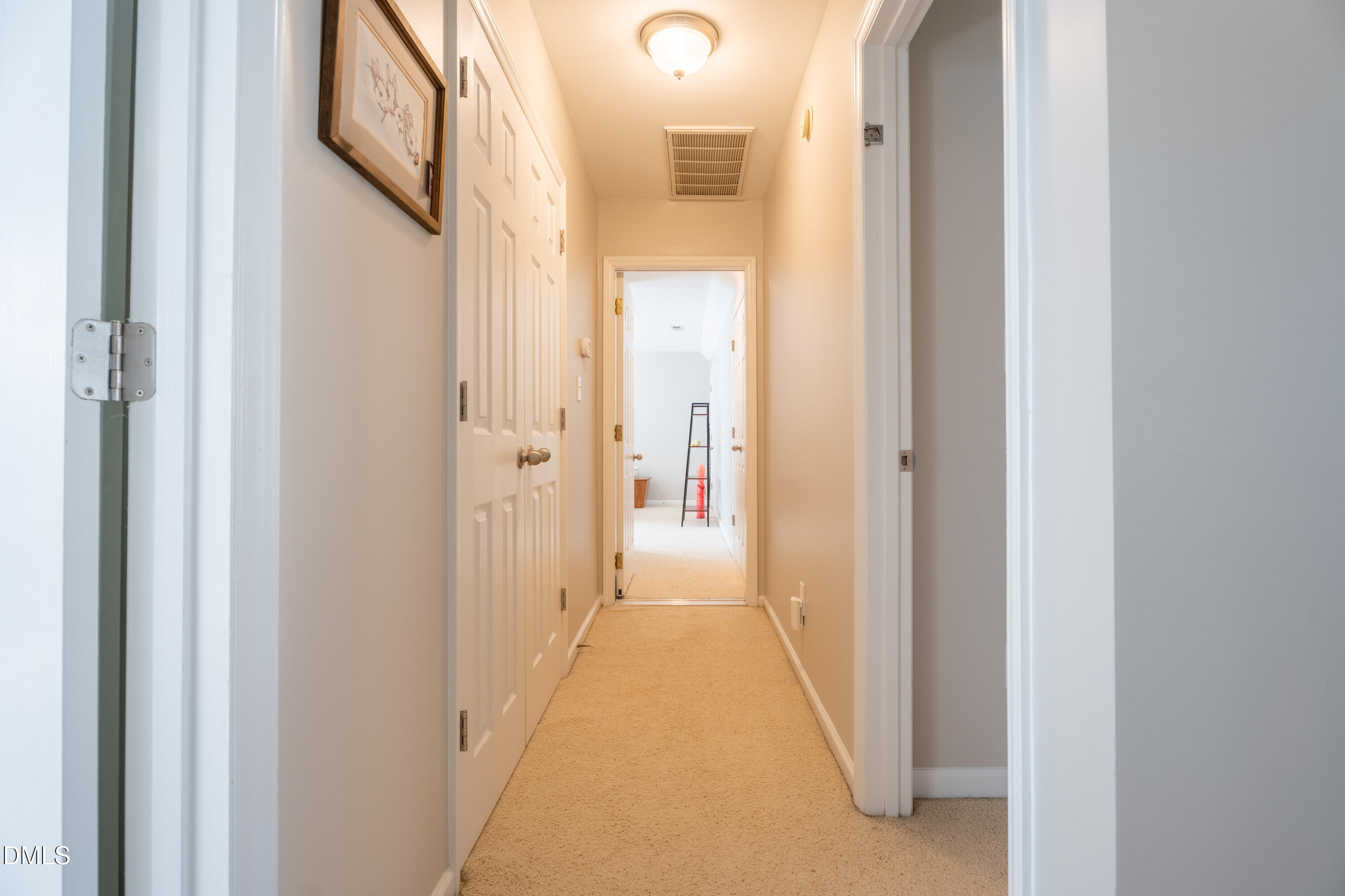 1305 Olde Walker Mill Road Apex, NC 27502 - Photo 26 of 41 a view of a hallway with wooden floor and glass door