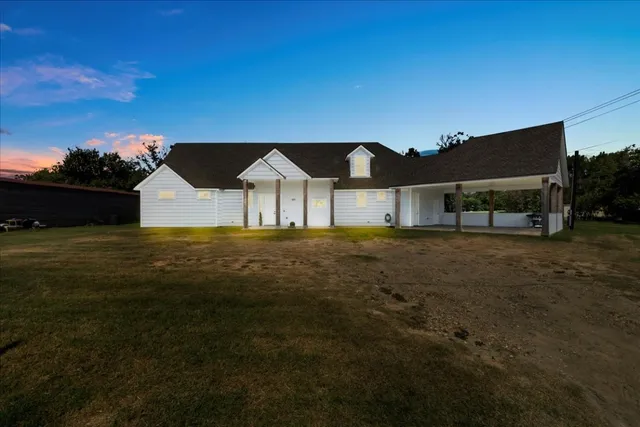 a house view with a garden space