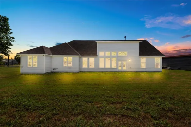 a front view of a house with swimming pool