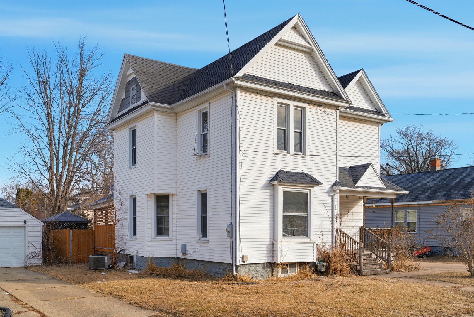 1507 West 9th Street Dixon, IL 61021 - Photo 16 of 22 a front view of a house with a yard