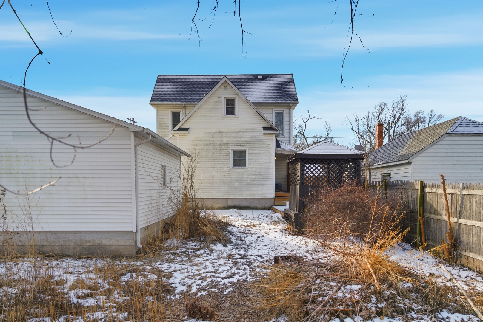 1507 West 9th Street Dixon, IL 61021 - Photo 20 of 22 a view of a house with a yard and garage