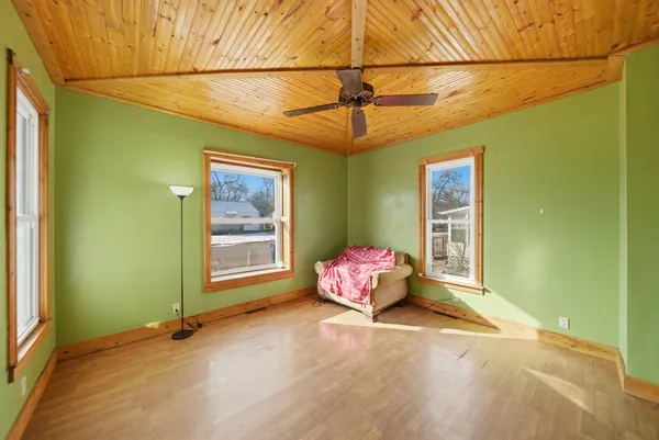 a view of empty room with windows