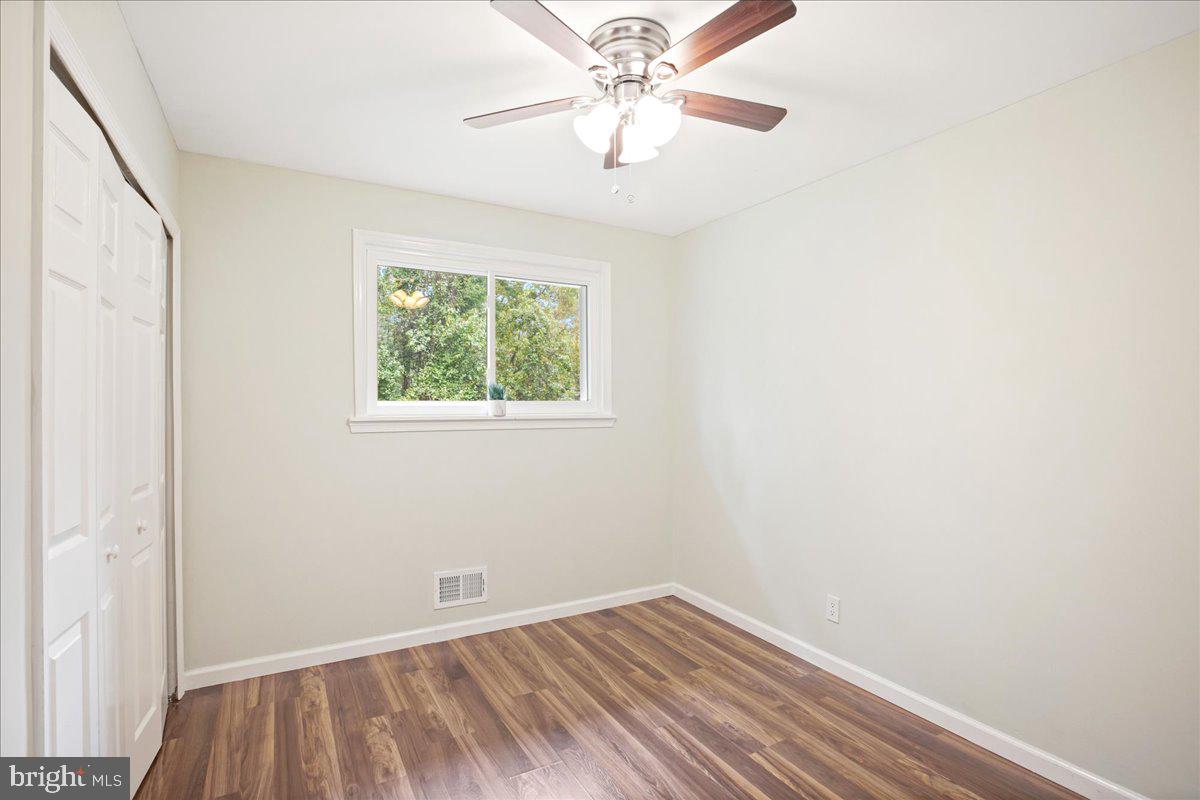 2809 Shiloh Church Road Bryans Road, MD 20616 - Photo 13 of 21 an empty room with a window and a fan