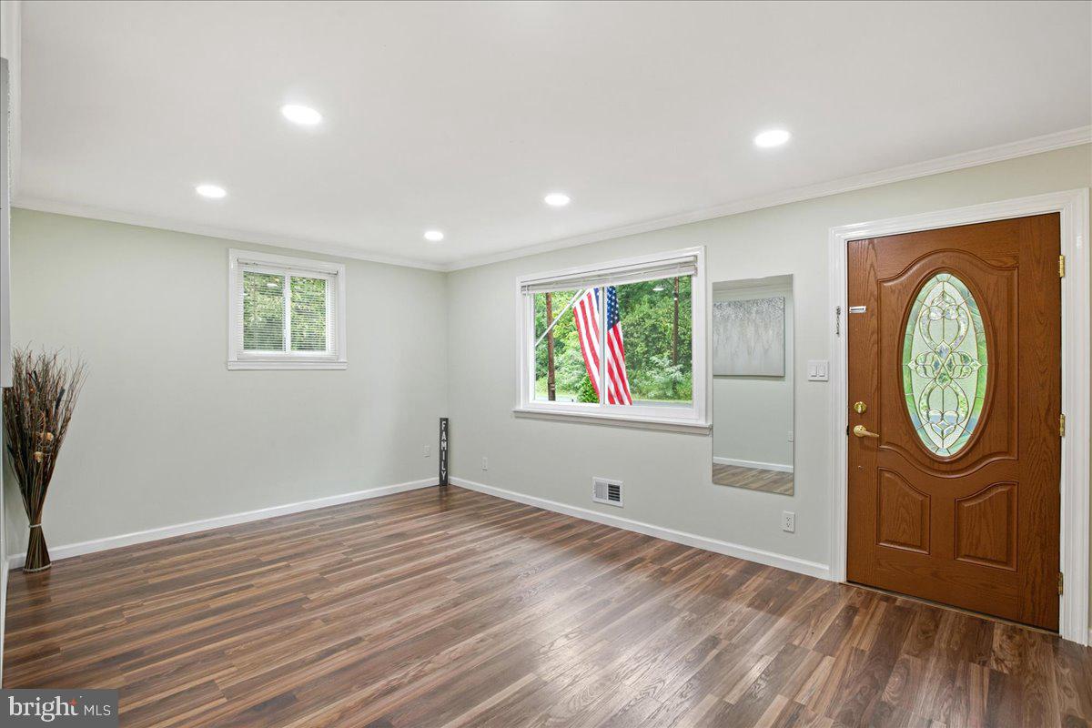 2809 Shiloh Church Road Bryans Road, MD 20616 - Photo 6 of 21 an empty room with window and wooden floor