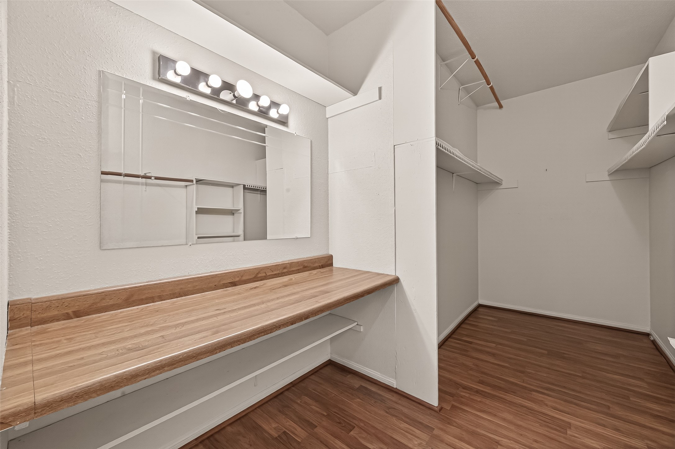 2100 Tanglewilde Street, Unit 596 Houston, TX 77063 - Photo 20 of 32 Wonderful walk in closet complete with dressing table and mirror