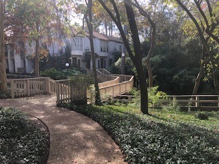 2100 Tanglewilde Street, Unit 596 Houston, TX 77063 - Photo 2 of 32 The complex is located on 27 wooded acres