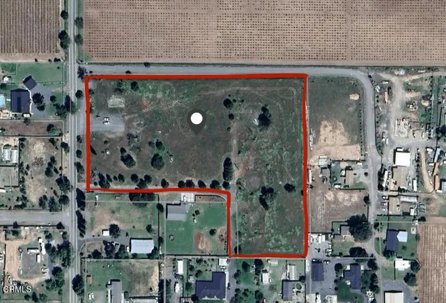 a utility room with lots of different colored cloths