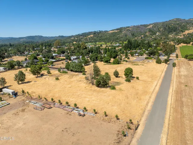 a view of a ocean with a mountain