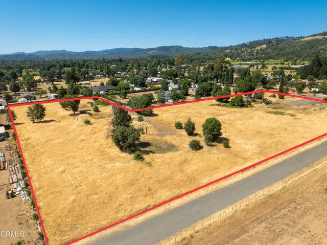 a view of swimming pool with a lake view