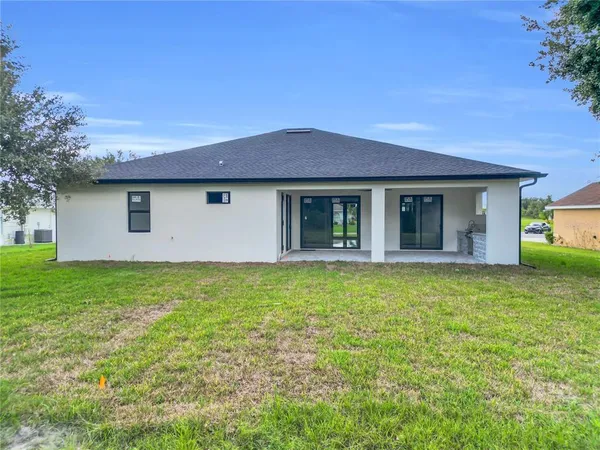 a house view with a garden space