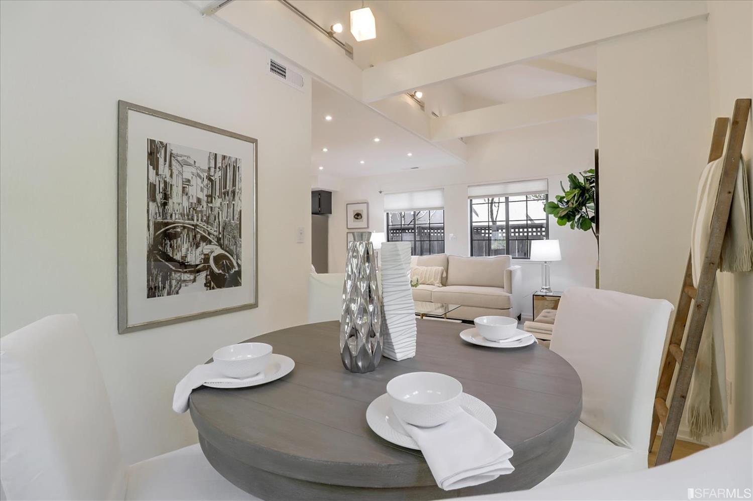 1397 Delaware Street Berkeley, CA 94702 - Photo 13 of 43 a dining room with furniture and wooden floor