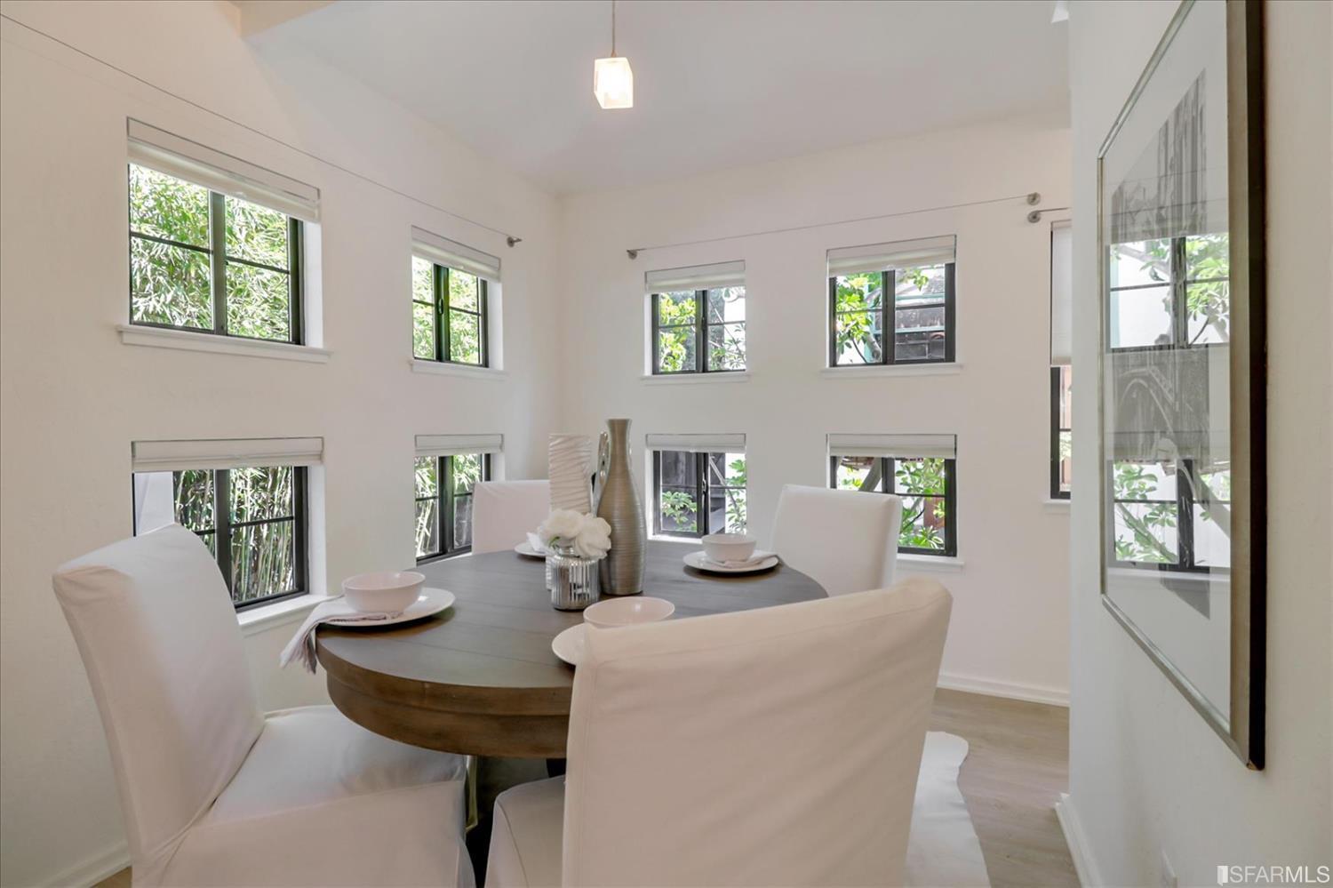 1397 Delaware Street Berkeley, CA 94702 - Photo 14 of 43 a living room with furniture and wooden floor