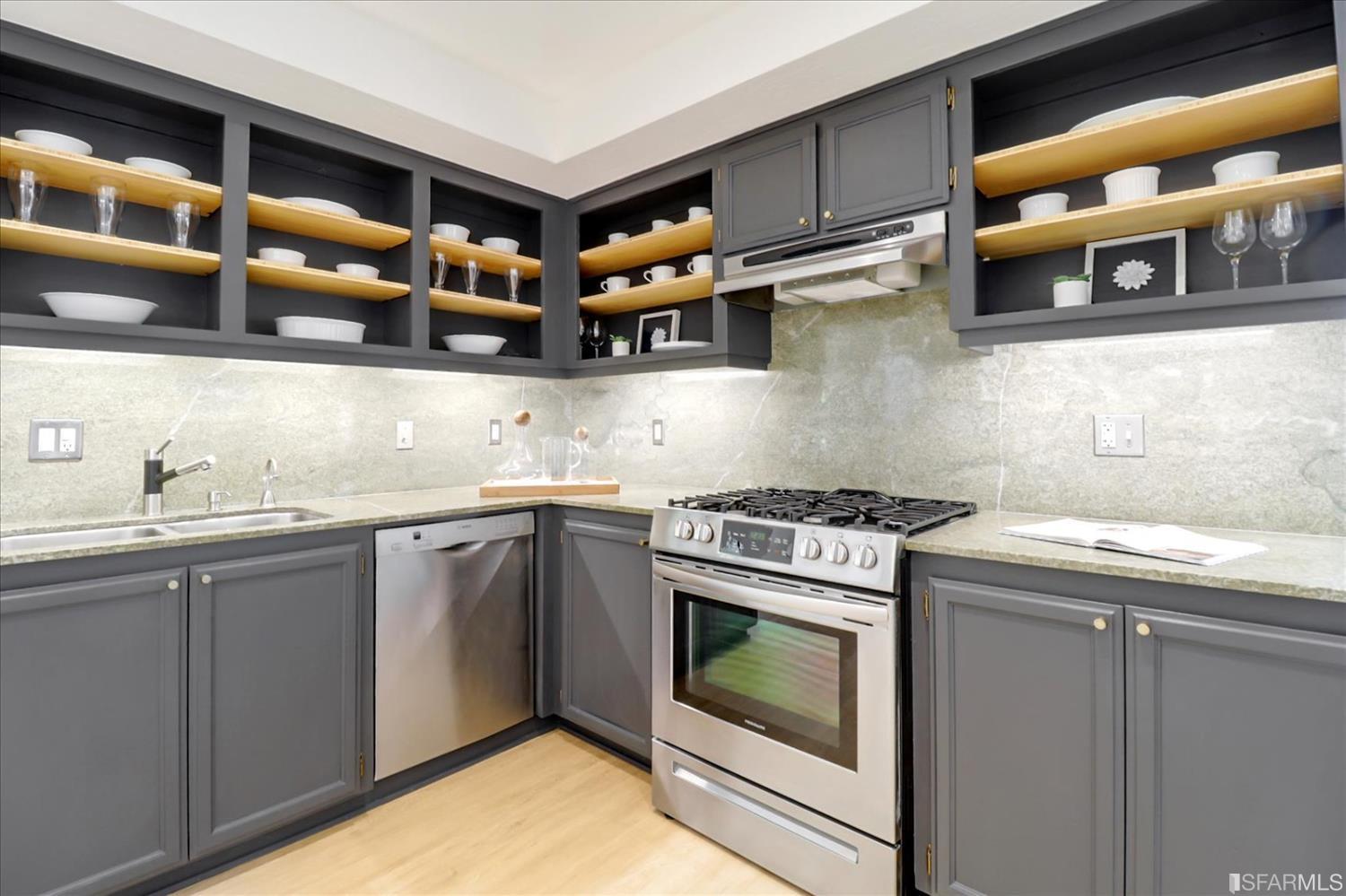 1397 Delaware Street Berkeley, CA 94702 - Photo 16 of 43 a kitchen with stainless steel appliances granite countertop a stove and a sink