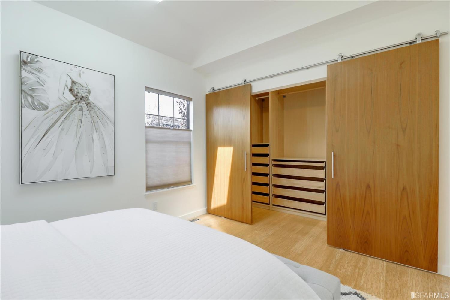 1397 Delaware Street Berkeley, CA 94702 - Photo 21 of 43 a bedroom with a bed and a cabinet