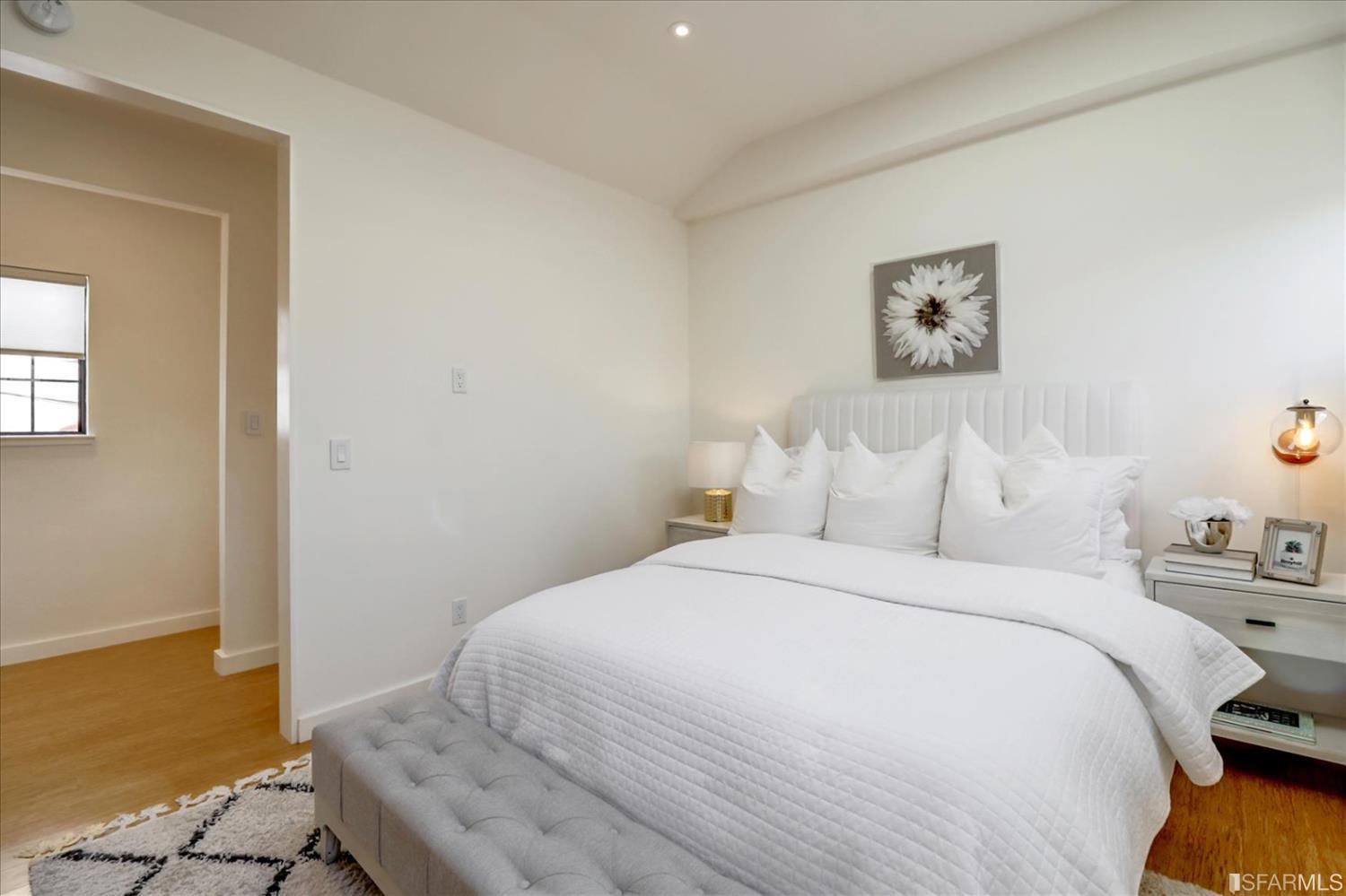 1397 Delaware Street Berkeley, CA 94702 - Photo 25 of 43 a bedroom with a bed and a window