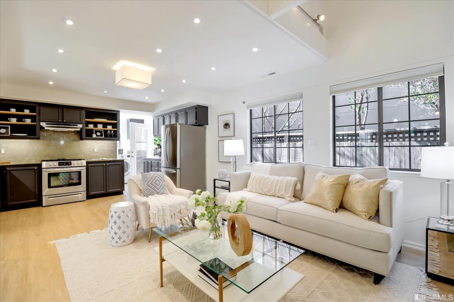 1397 Delaware Street Berkeley, CA 94702 - Photo 3 of 43 a living room with furniture wooden floor and kitchen view
