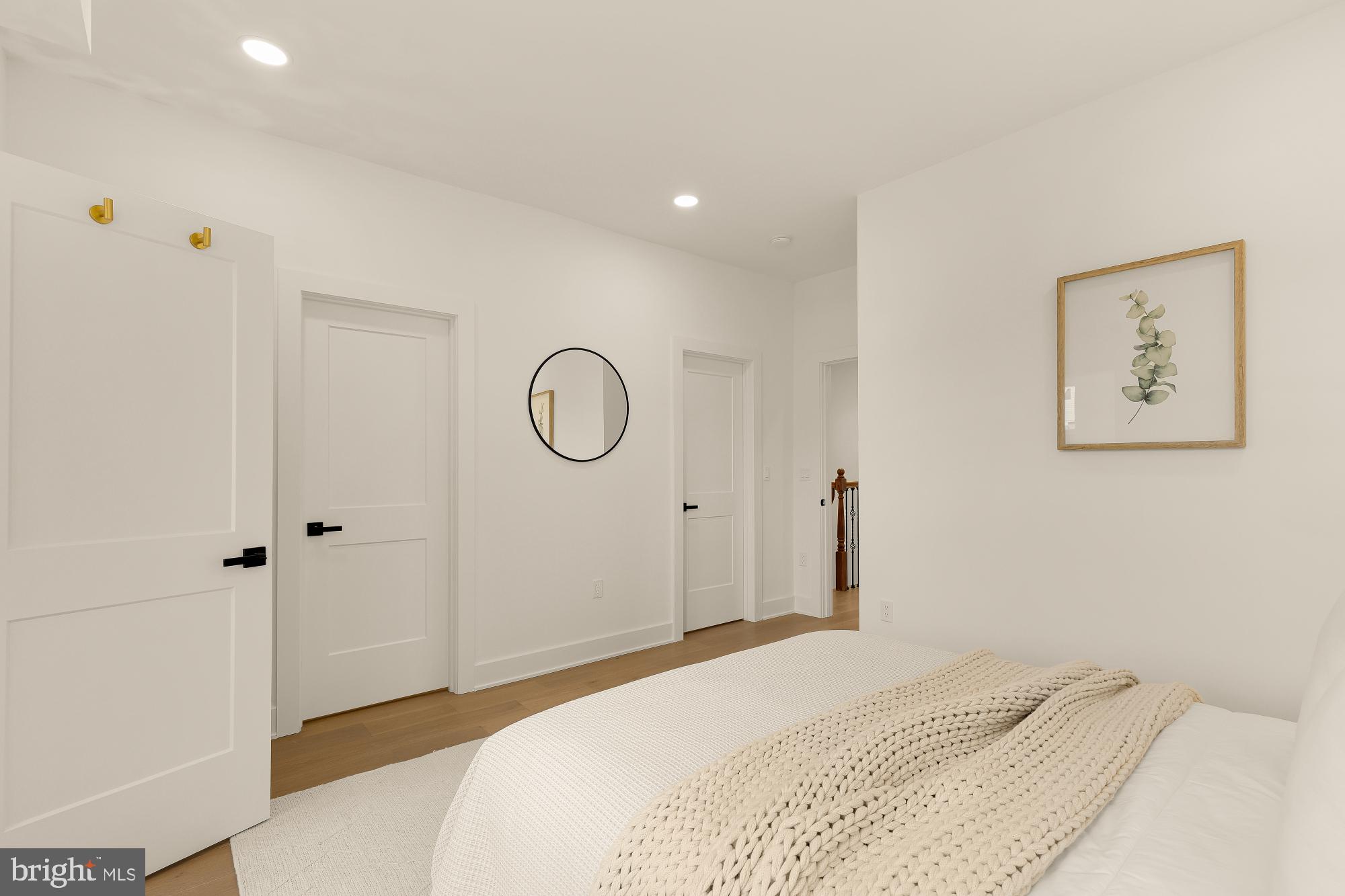 1710 2nd Street Northwest Washington, DC 20001 - Photo 17 of 37 Serene bedroom with modern elegance.