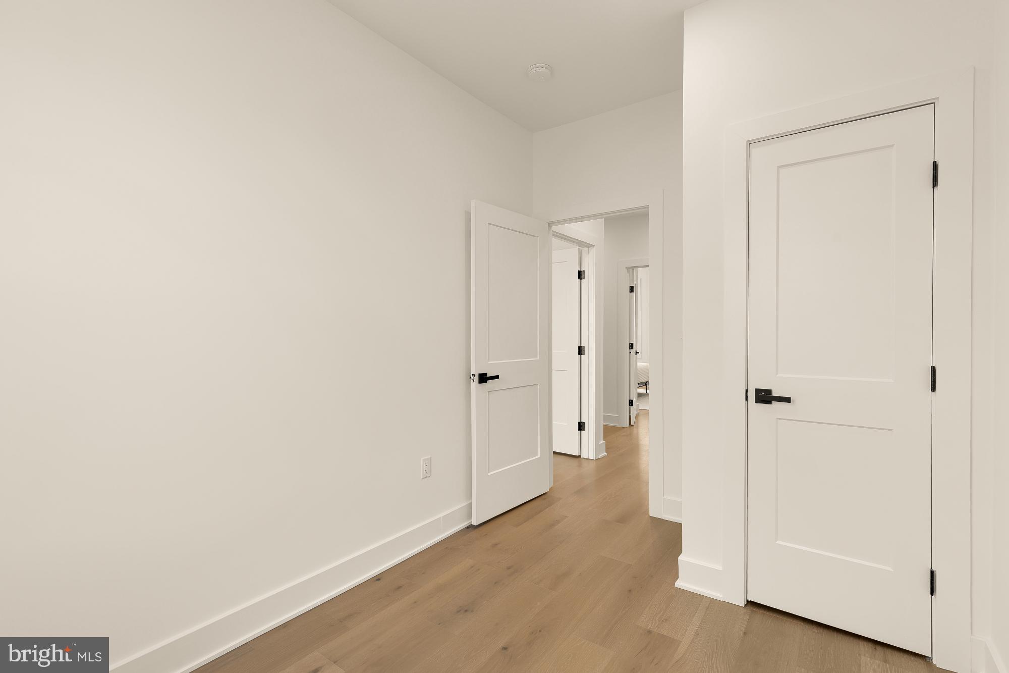 1710 2nd Street Northwest Washington, DC 20001 - Photo 25 of 37 Modern hallway with sleek doors.