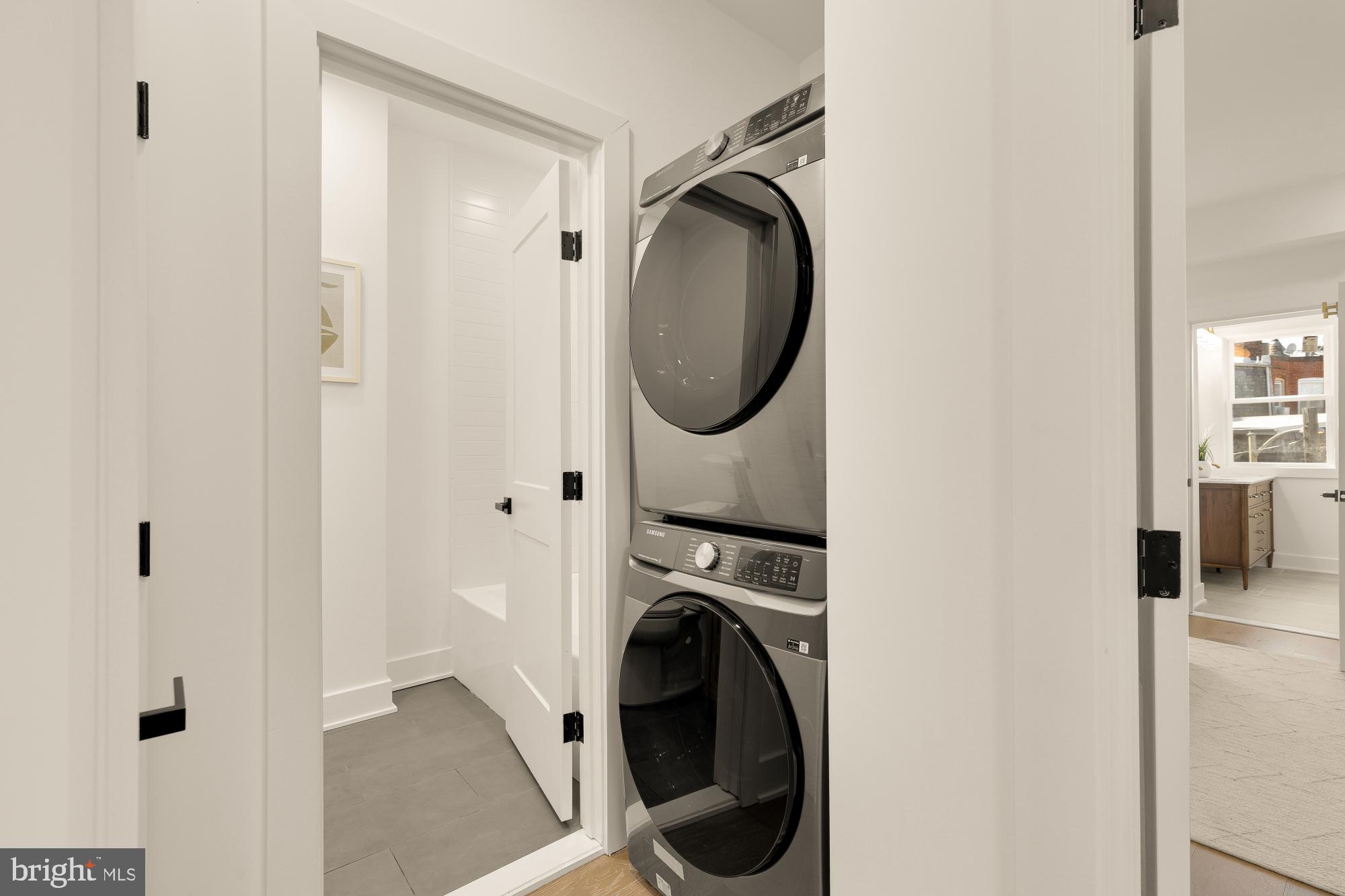 1710 2nd Street Northwest Washington, DC 20001 - Photo 26 of 37 Sleek laundry nook in modern design.