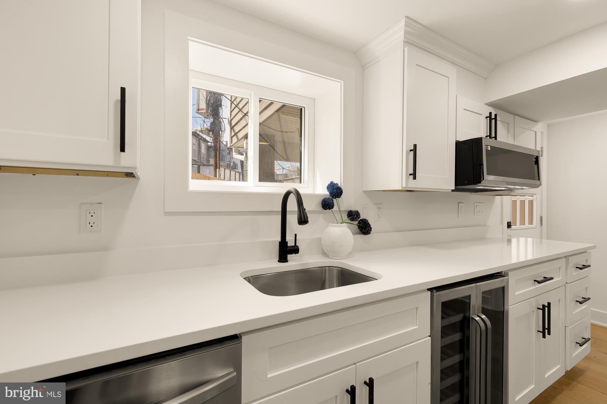1710 2nd Street Northwest Washington, DC 20001 - Photo 32 of 37 Modern kitchen with sleek finishes.