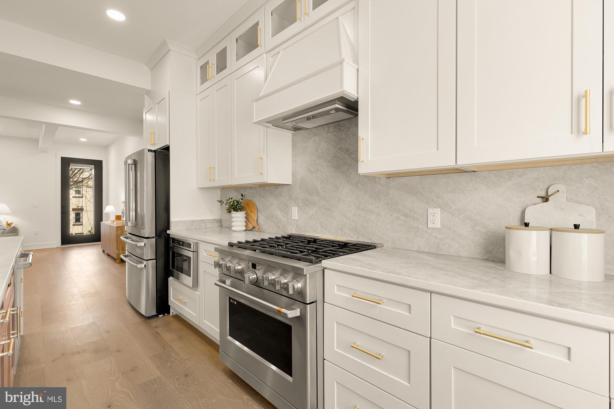 1710 2nd Street Northwest Washington, DC 20001 - Photo 9 of 37 Sleek modern kitchen with elegant finishes.