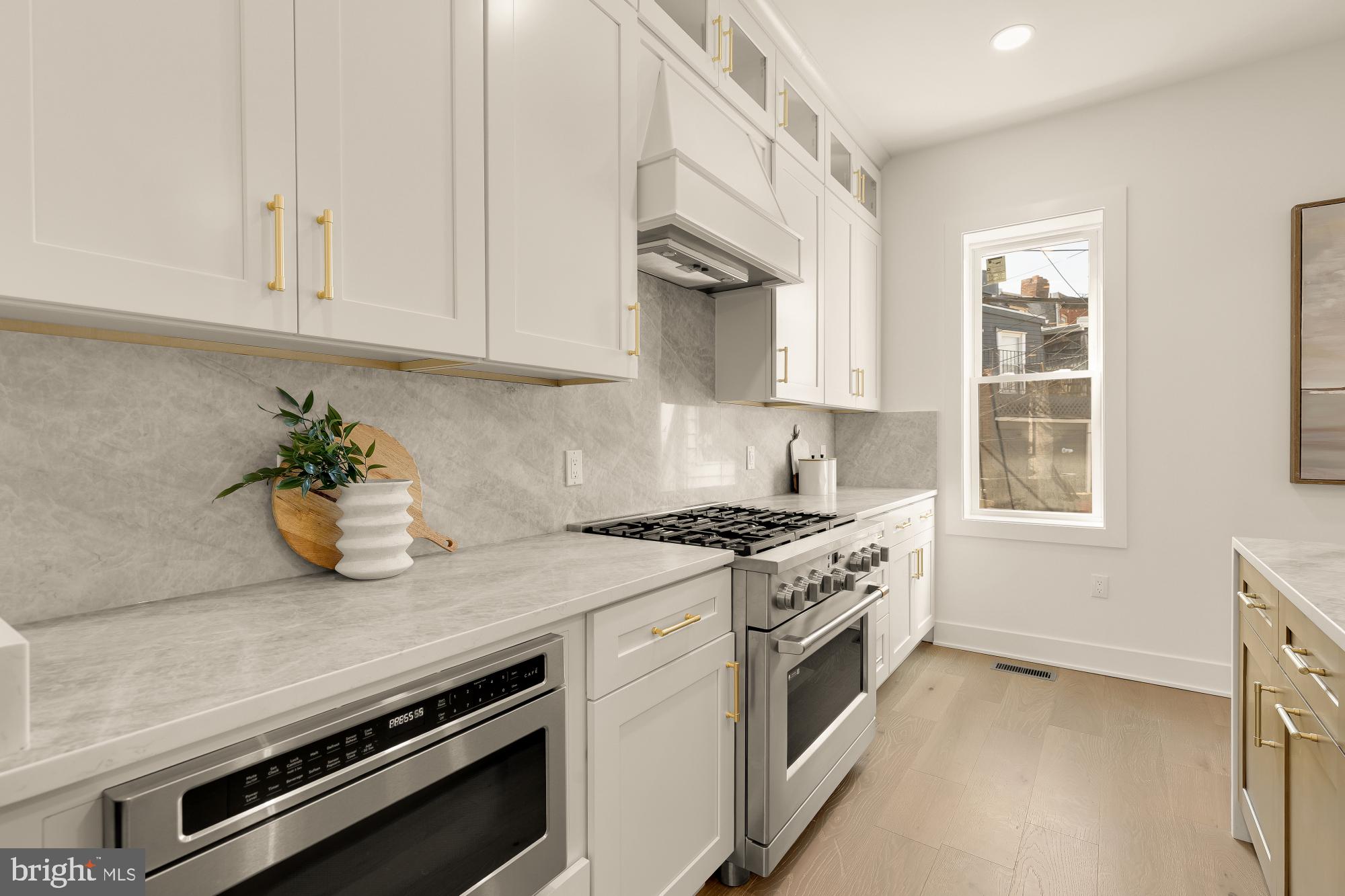 1710 2nd Street Northwest Washington, DC 20001 - Photo 10 of 37 Modern kitchen with sleek finishes.