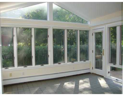 51 Cleveland Road Brookline, MA 02467 - Photo 9 of 15 a view of wooden floor with a view of house