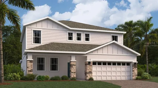 a view of house with a yard