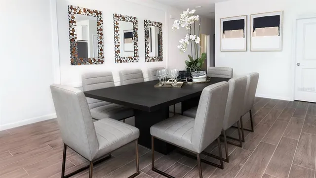a view of a dining room with furniture and wooden floor
