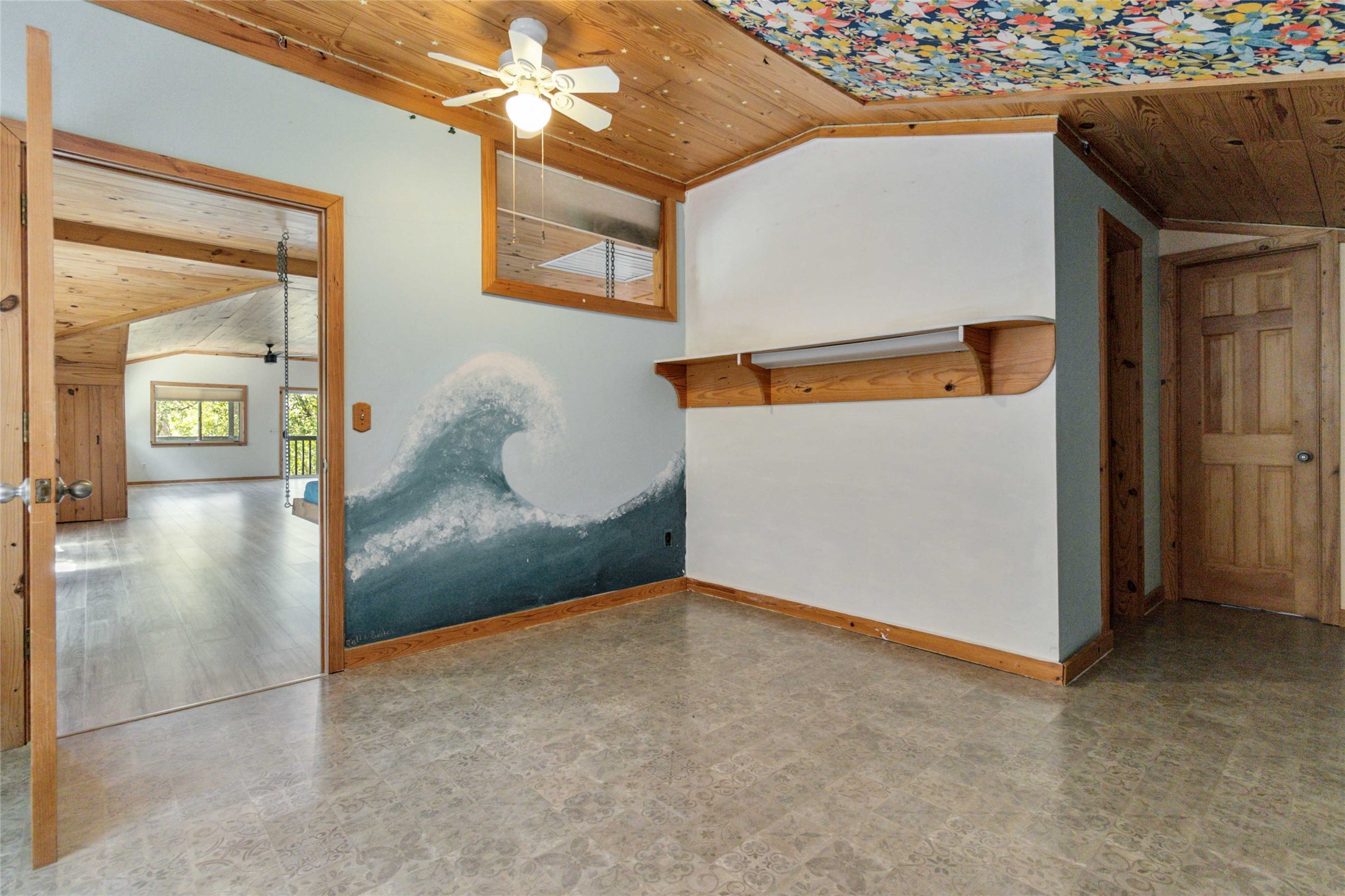 180 Ironstone Road Smithville, TX 78957 - Photo 24 of 37 Spare room featuring a vaulted wood ceiling, ceiling fan, and tile patterned floors