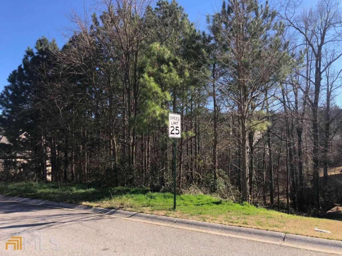 a view of street along with trees