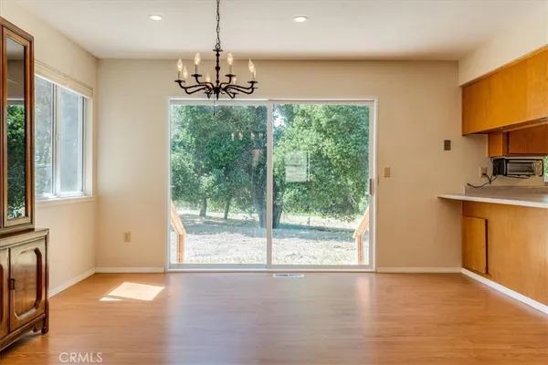 a kitchen with stainless steel appliances granite countertop sink stove and cabinets