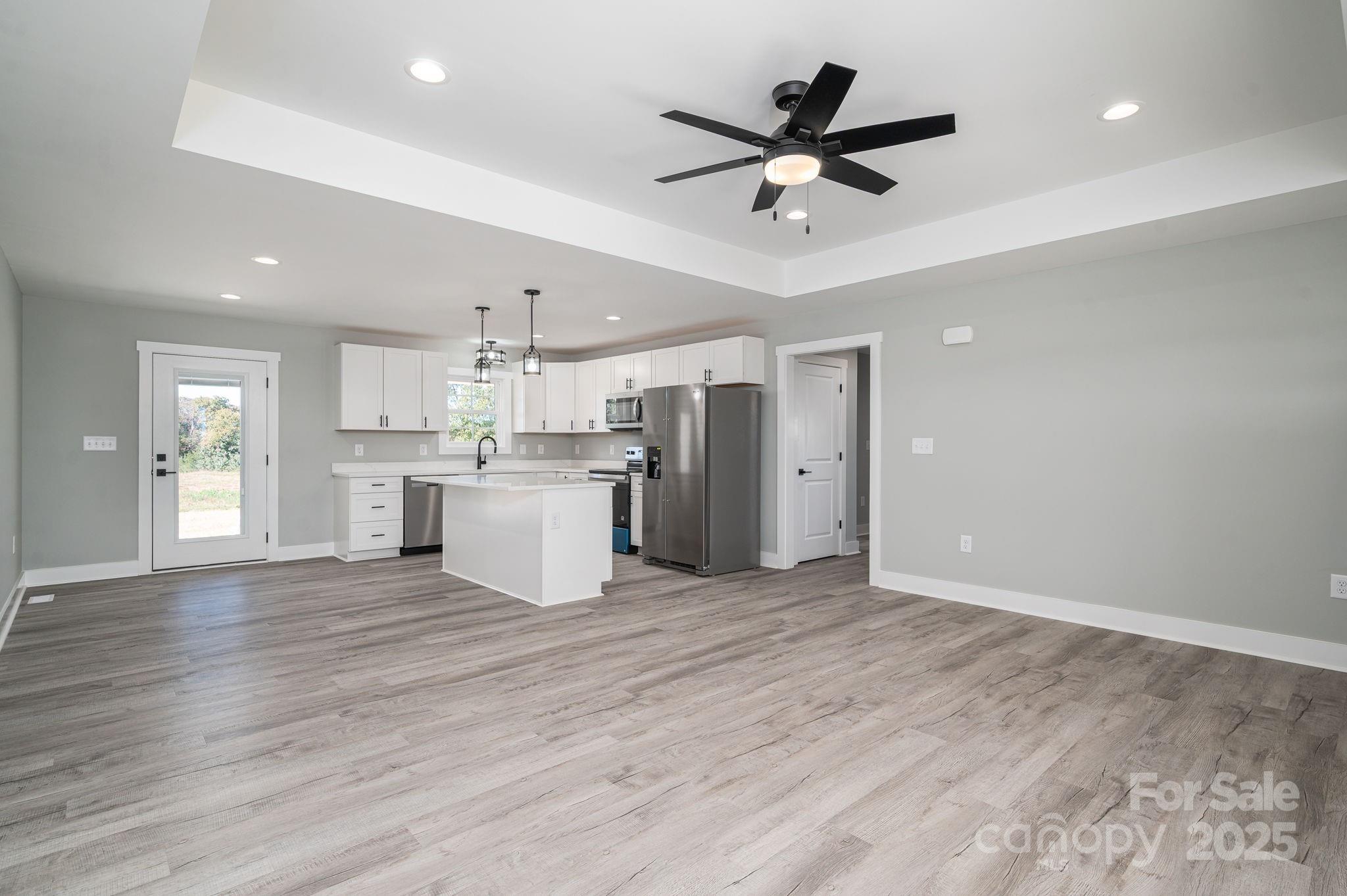 367 Northbrook III School Road Vale, NC 28168 - Photo 12 of 40 a view of a kitchen with a sink and refrigerator