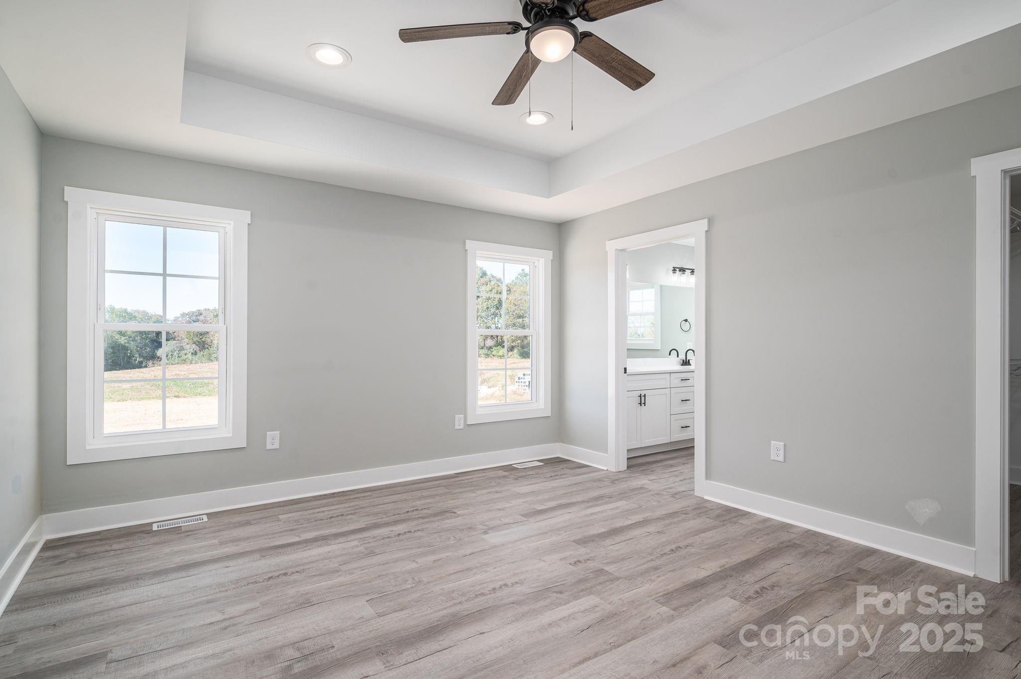 367 Northbrook III School Road Vale, NC 28168 - Photo 22 of 40 a view of an empty room with a window and wooden floor