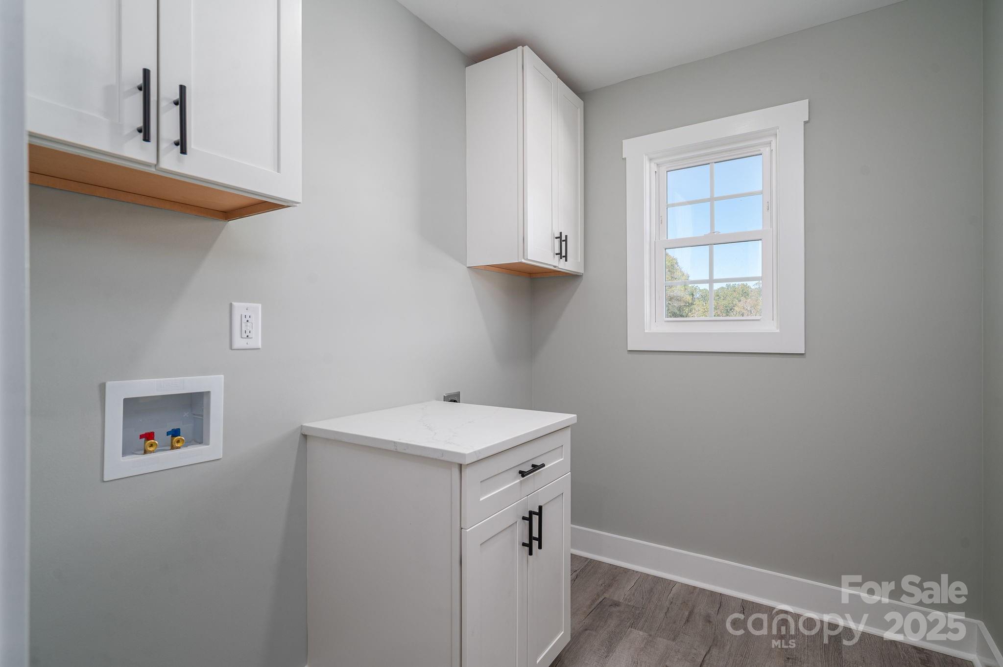 367 Northbrook III School Road Vale, NC 28168 - Photo 35 of 40 a bathroom with a sink a vanity and a window