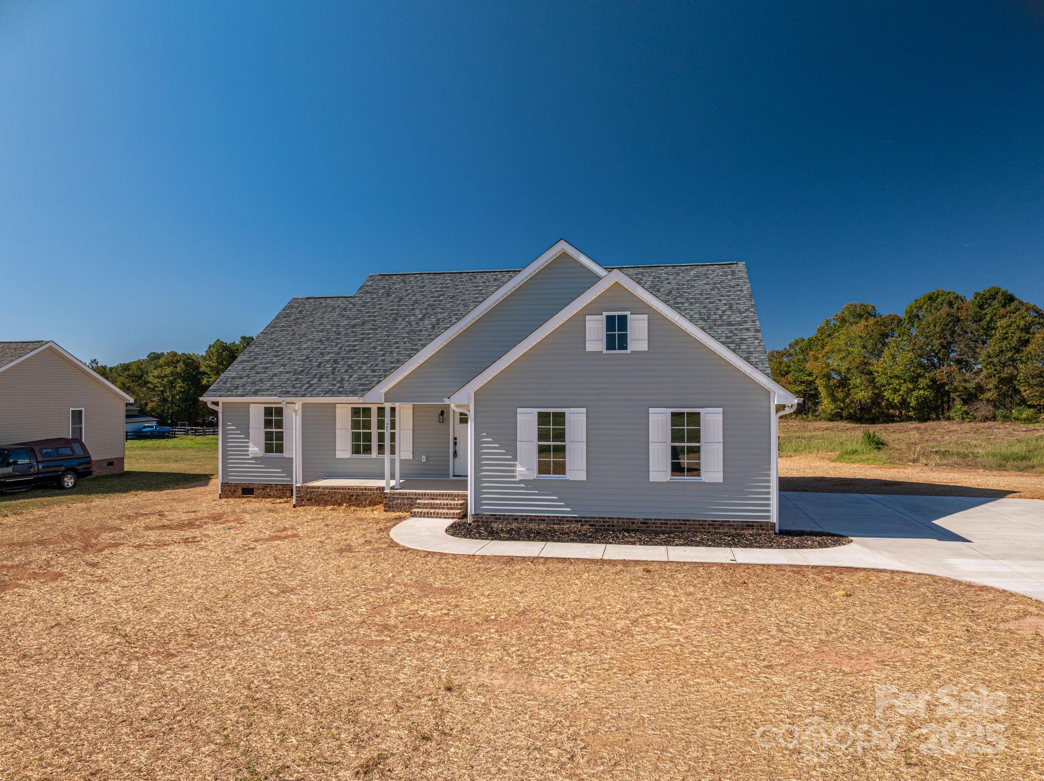 367 Northbrook III School Road Vale, NC 28168 - Photo 9 of 40 a front view of a house with a yard