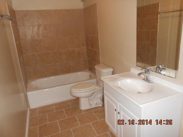 10210 New Hope Road Bon Aqua, TN 37025 - Photo 12 of 16 LARGE NEWLY TILED BATH IN BASEMENT